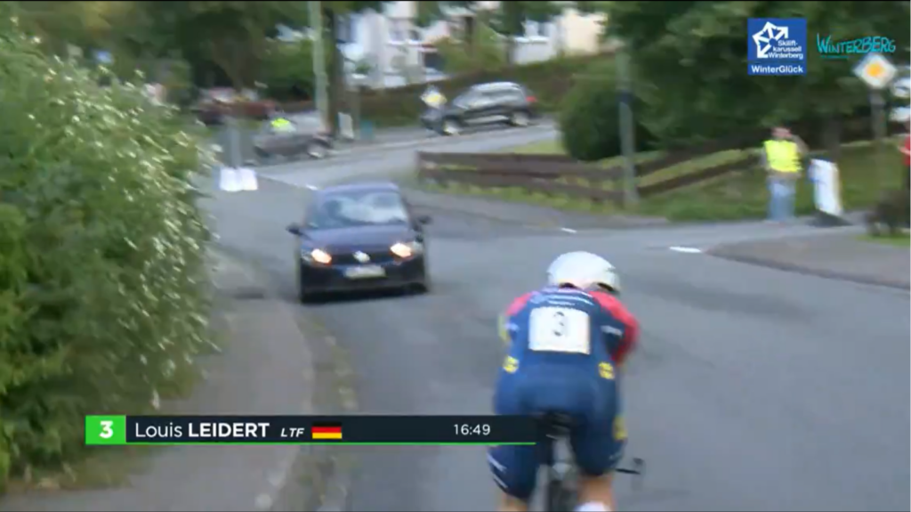 Rider narrowly avoids two drivers on race course in quick succession in Germany