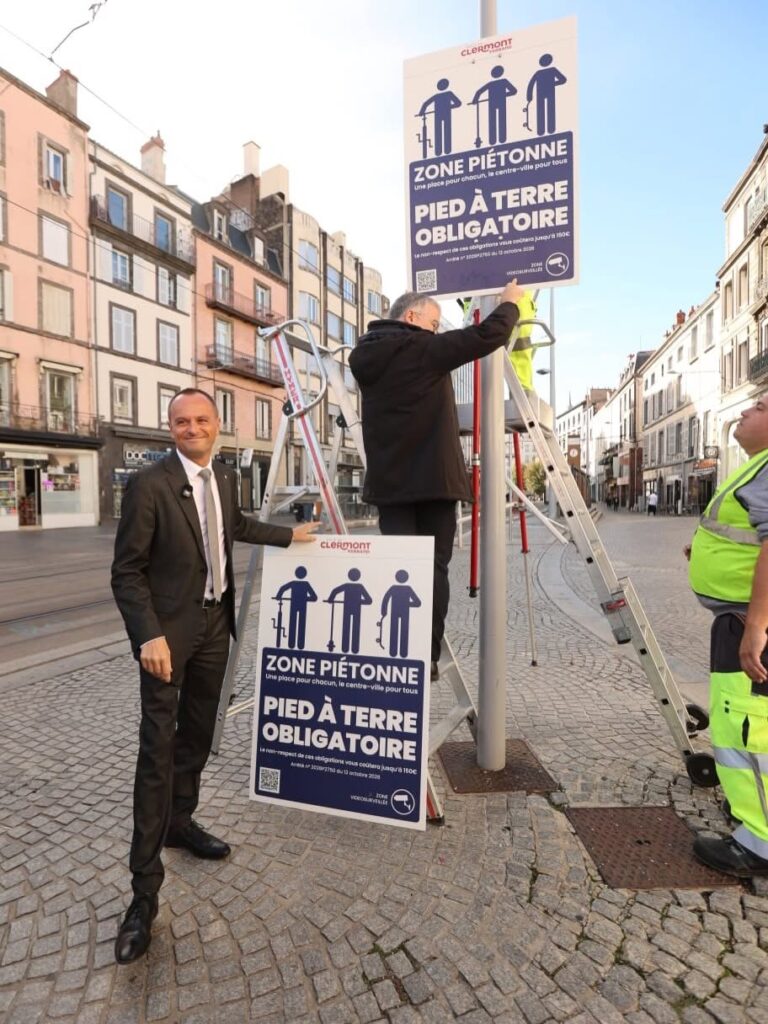 Clermont-Ferrand mayor Julien Bony unveiling bike ban signs