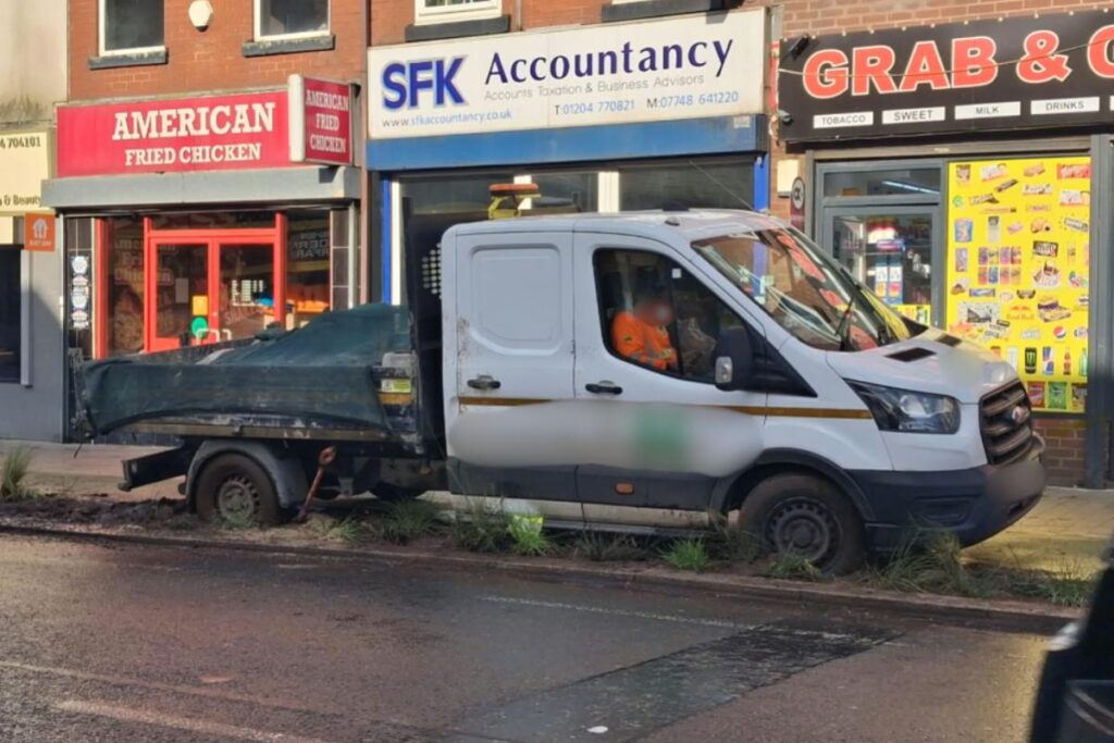 Lorry driver gets stuck in cycle lane rain garden day after it was installed 2