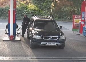 Simon Richardson putting petrol in his car shortly after killing cyclist Michael Mullins