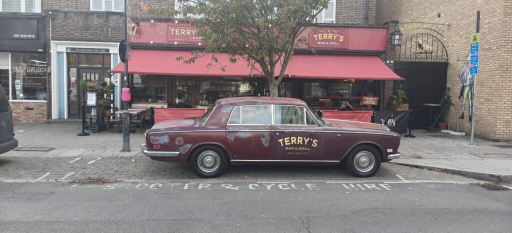Terry’s Cafe car blocking bike parking