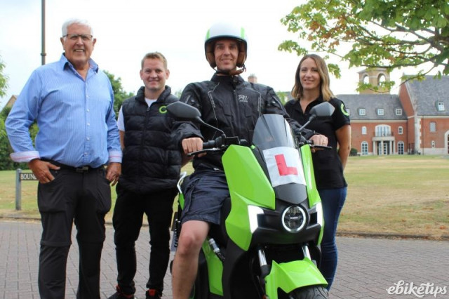 Nick Hawkins on e-moped.jpg