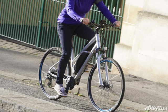 carrera-crossfire-e-womens-electric-bike-riding-4.jpg, action