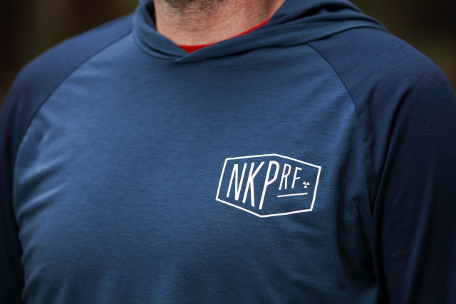 2021 Nukeproof Outland Hooded LS Tee Logo.jpg