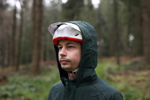 2022 Pnw Lander jacket hood over helm.jpg