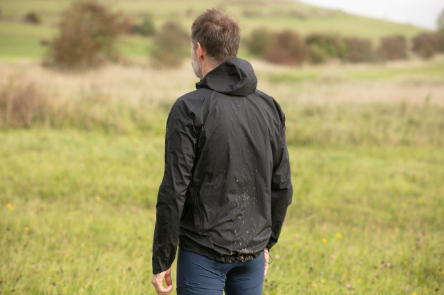 2023 Rab Cinder Downpour Waterproof Jacket rear.jpg