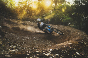 Mondraker Sly through a berm