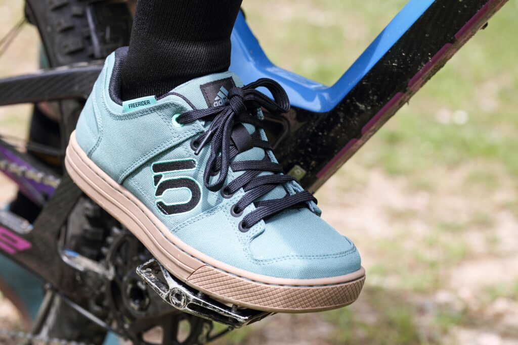 2021 fiveten freerider primeblue W on bike.jpg