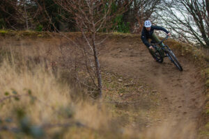 2022 YT Izzo Core 3 berm cornering female woman.jpg
