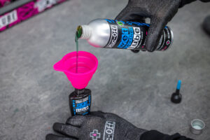 2022 muc off refillable lube hero.jpg