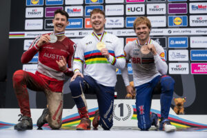 Andreas Kolb, Charlie Hatton, Laurie Greenland on podium