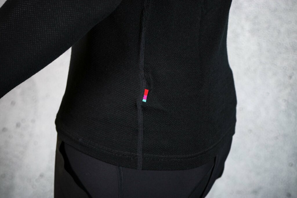 2023 Velocio Merino Mesh three-season baselayer – logo tab.jpg