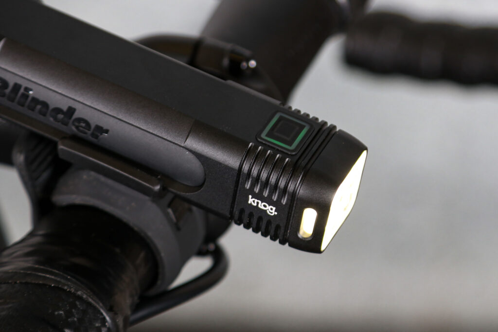 2024 Knog Blinder Pro 900 + Mid Cobber Rear - Light Set - front light power button.jpg