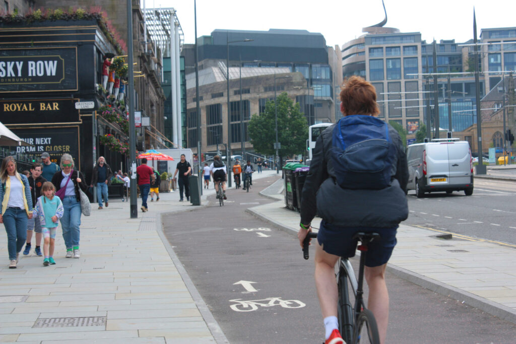 Cyclist using cycle lane in Edinburgh