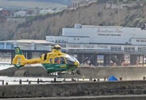 Air ambulance lands on beach to treat cyclist pushed off seawall in Sandown