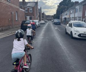 Children cycling on Active Travel Street