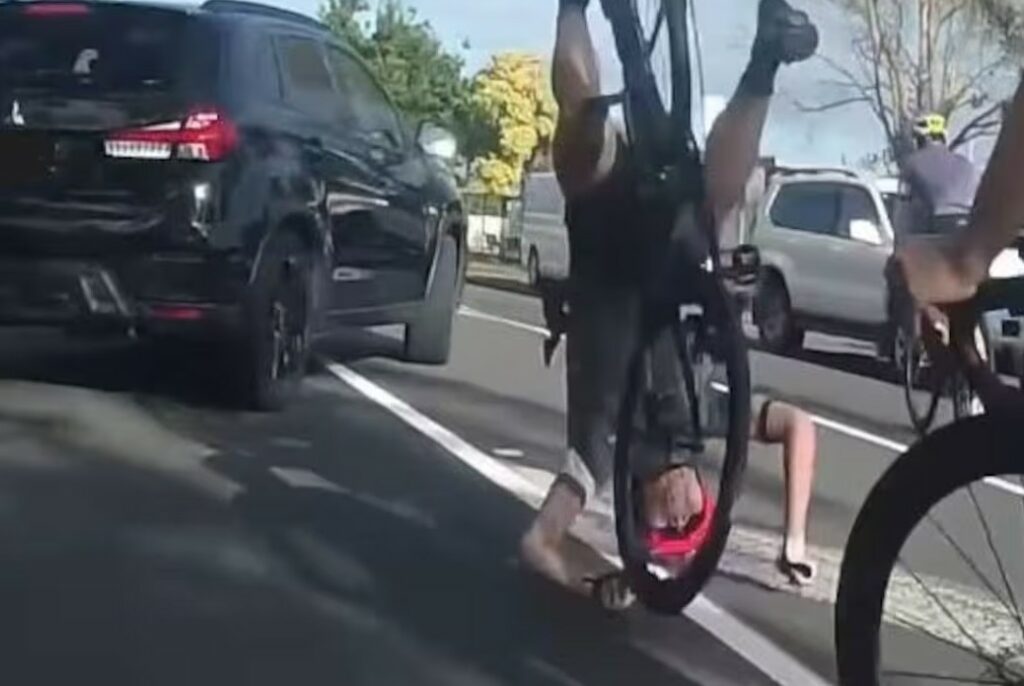Cyclist flies over handlebars and “nearly breaks neck” after uninsured SUV driver pulls out in Auckland New Zealand