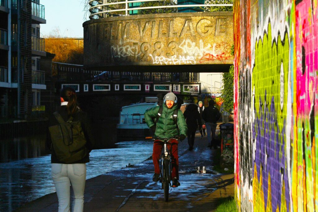 Cyclist in London canal – copyright Simon MacMichael