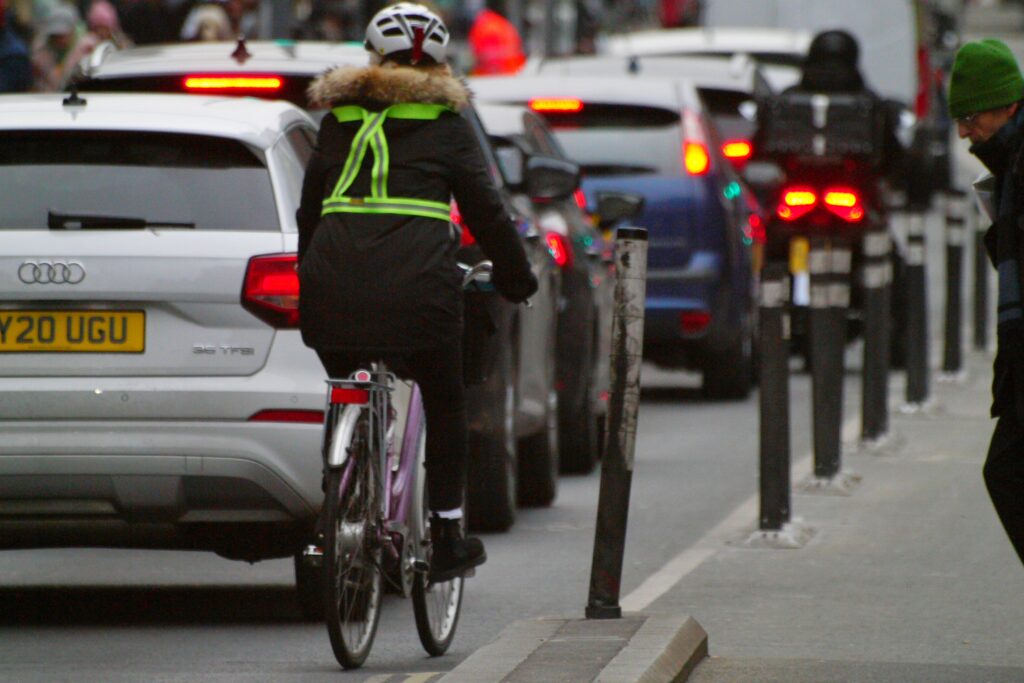 Cyclist in London high-vis braces – copyright Simon MacMichael