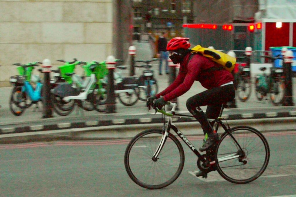 Cyclist in London with winter clothing and Trek bike &ndash; copyright Simon MacMichael