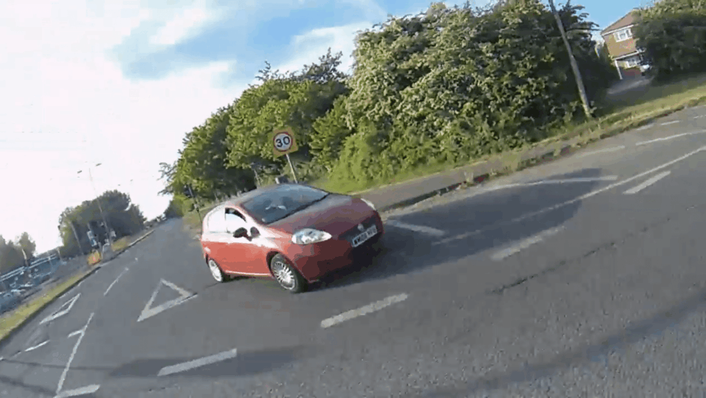 Driver hits cyclist at roundabout