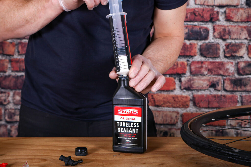 Fitting tubeless tyres – 20 – fill syringe with tubeless sealant