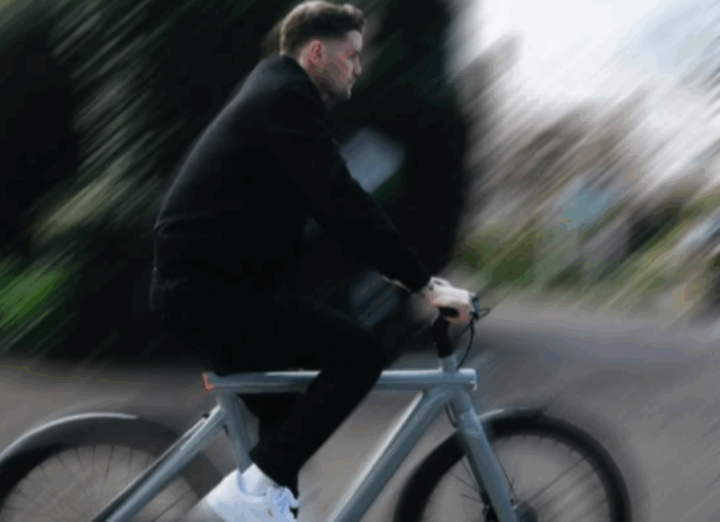 Premier League manager Fabian Hürzeler riding Van Moof bike for advert