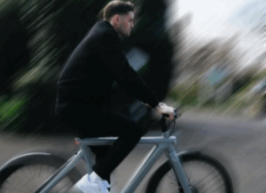 Premier League manager Fabian Hürzeler riding Van Moof bike for advert