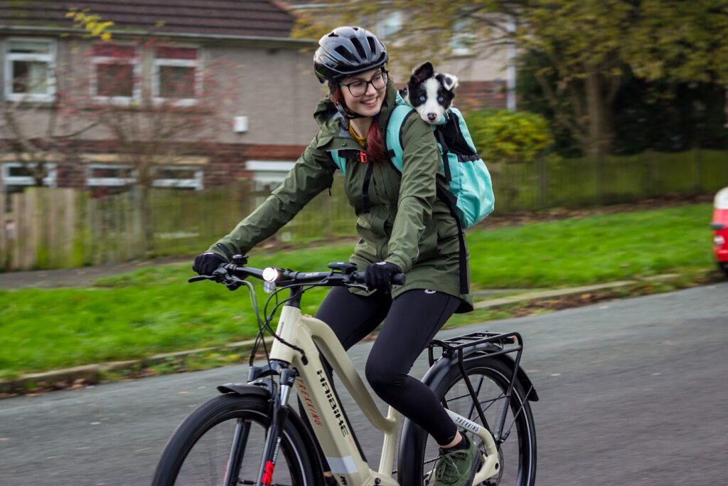 Dog in backpack with e-bike