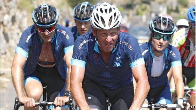 Lance Armstrong and Geoff Thomas riding the Tour 21 in 2015