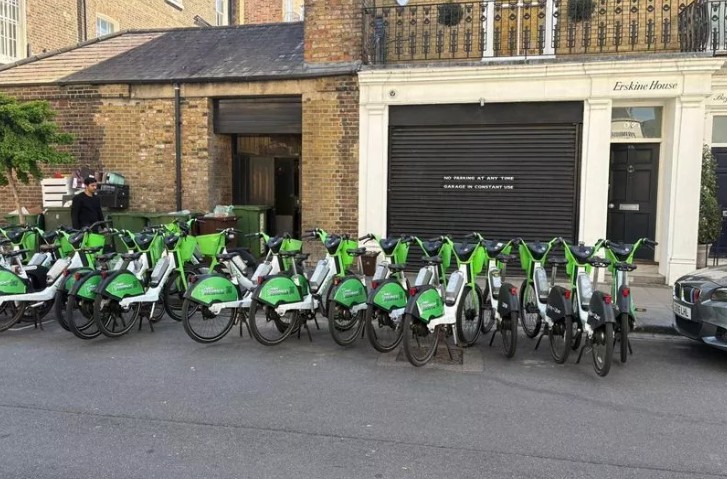 Lime Bikes parked outside Lemonia restaurant, Primrose Hill