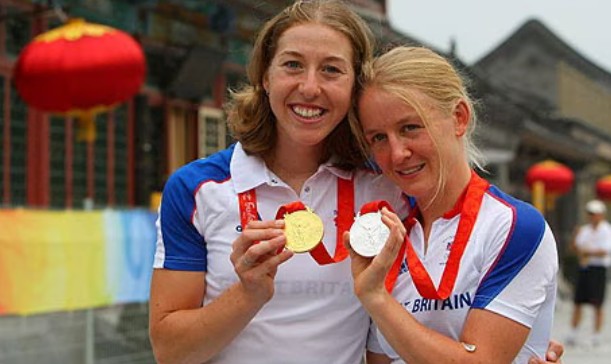 Nicole Cooke and Emma Pooley show off their medals from the 2008 Olympics in Beijing