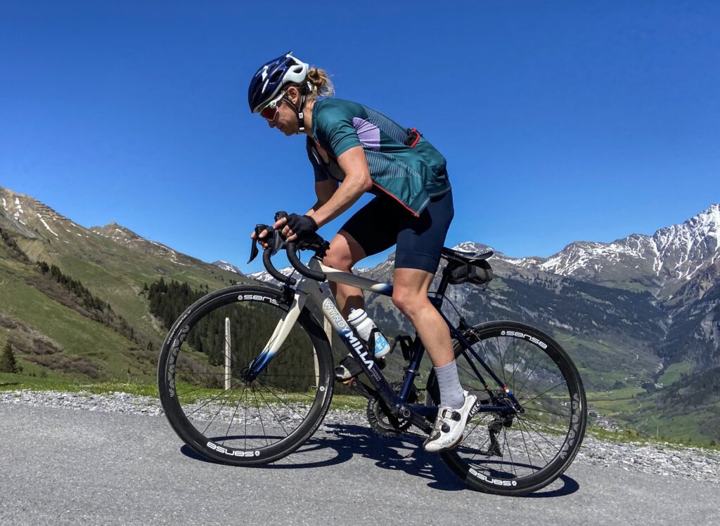 Emma Pooley cycling in the mountains