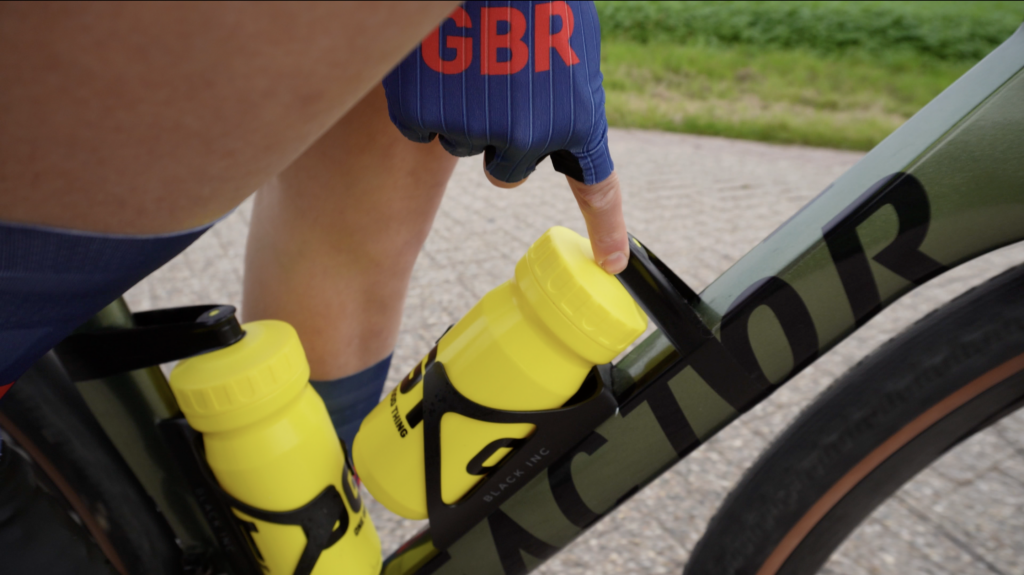 2025 Gravel Worlds Tech Gallery bottle cages secured to bike