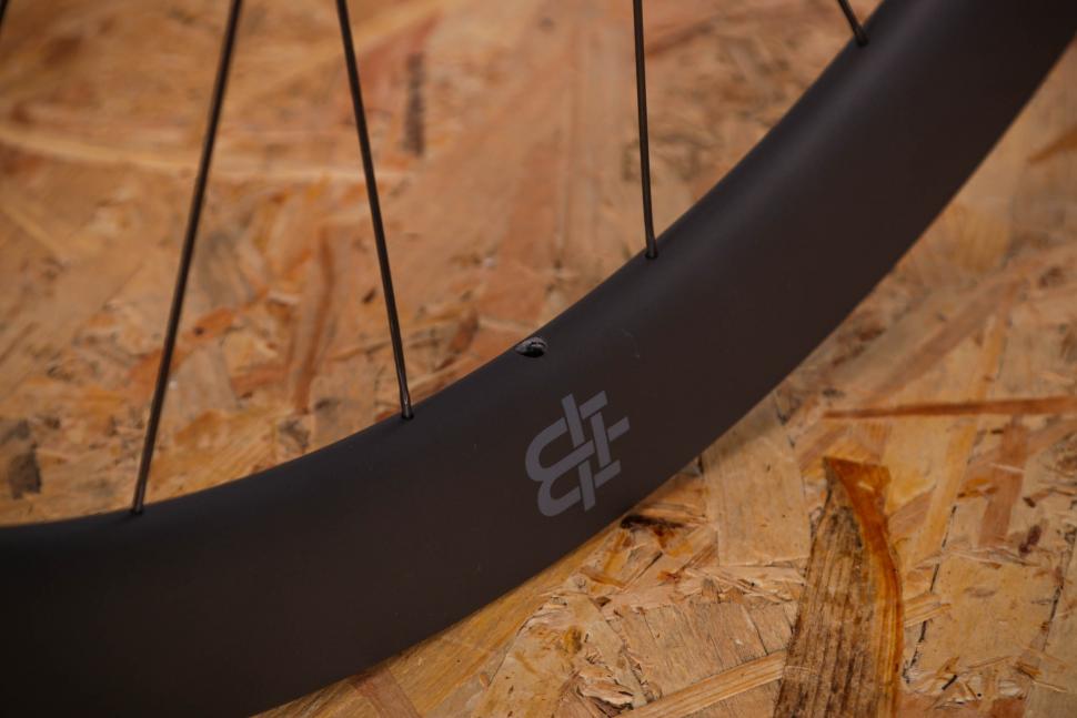 2021 Black Inc FORTY FIVE wheelset - valve hole.jpg
