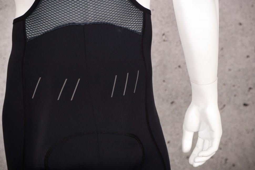 2021 CHPT3 Most Days Grand Tour Mens Bib Shorts - back reflective detail.jpg