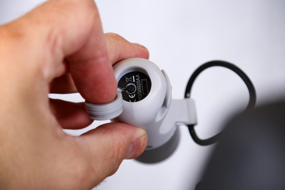 2021 Knog Plugger Front Light Polar Bear White - button and charging port.jpg