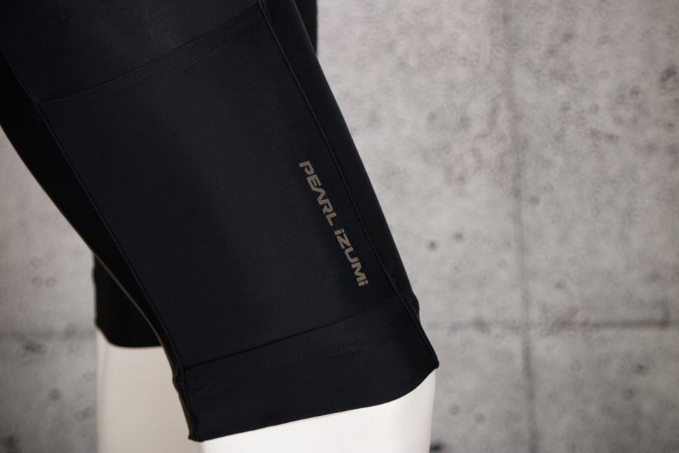 2021 PEARL iZUMi Expedition Bib Short - logo and cuff.jpg