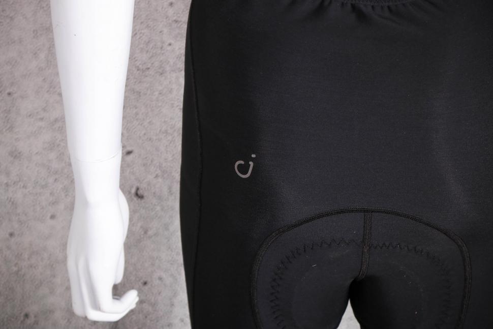 2021 Velocio Womans Thermal bib tight - logo back.jpg