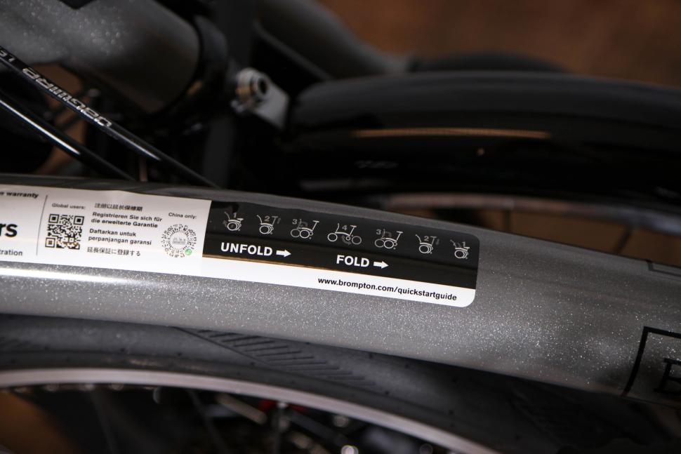 2022 Brompton P Line Urban Storm Grey High - folding sticker.jpg