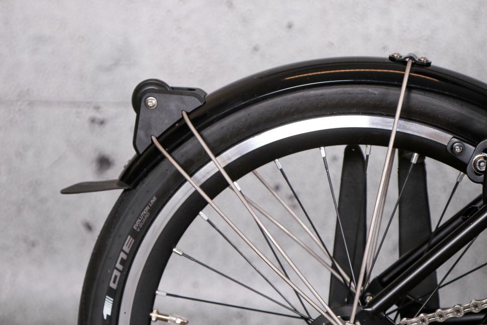 2022 Brompton P Line Urban Storm Grey High - rear guard wheel.jpg