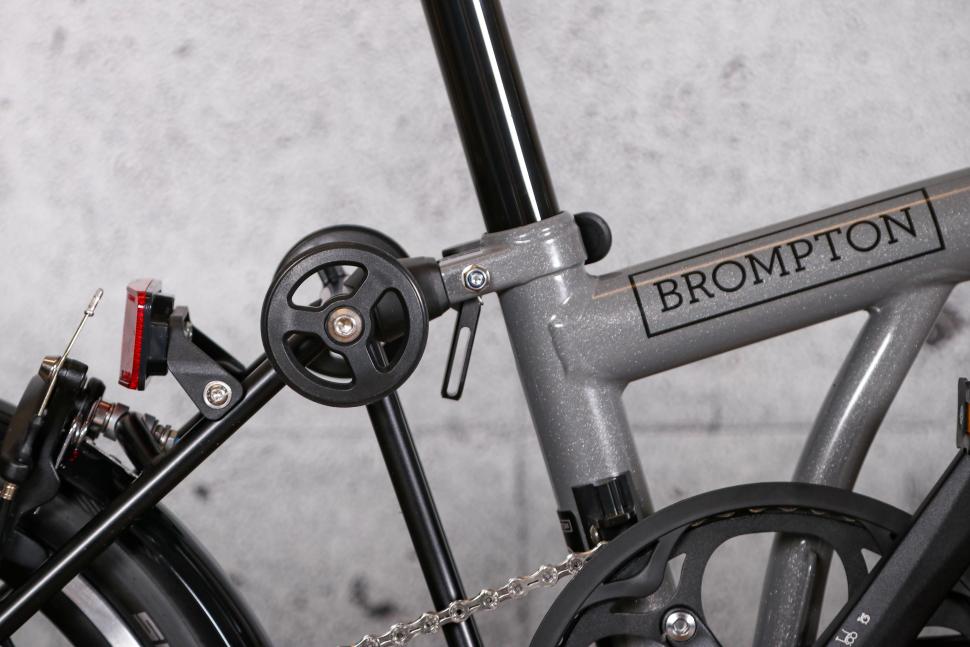 2022 Brompton P Line Urban Storm Grey High - seat tube and folding frame wheels.jpg