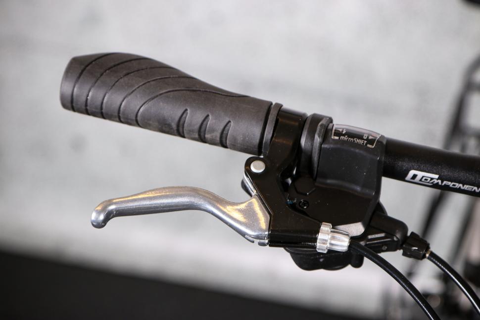 2022 Carrera Intercity Folding Bike - brake lever and shifter.jpg