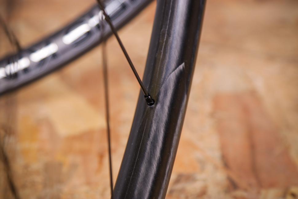 2022 Chris King GRD23 R45D Wheelset - spoke nipple 2.jpg
