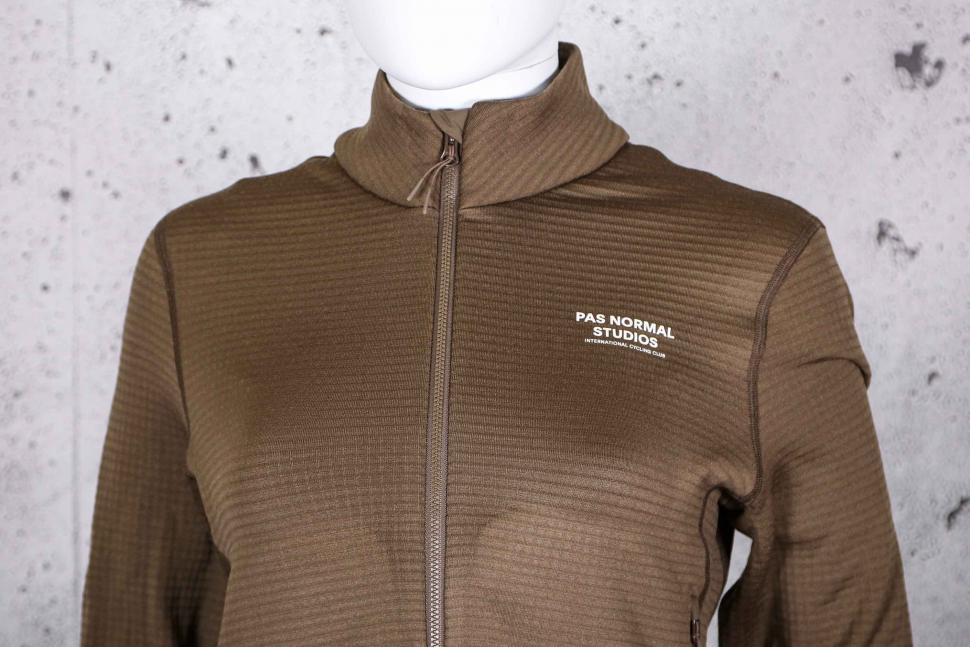 2022 Pas Normal Studios Women's Escapism Performance Fleece Zip - chest.jpg