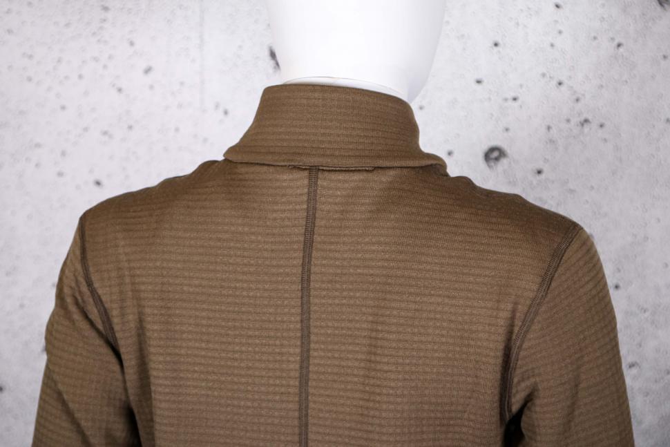 2022 Pas Normal Studios Women's Escapism Performance Fleece Zip - shoulders.jpg