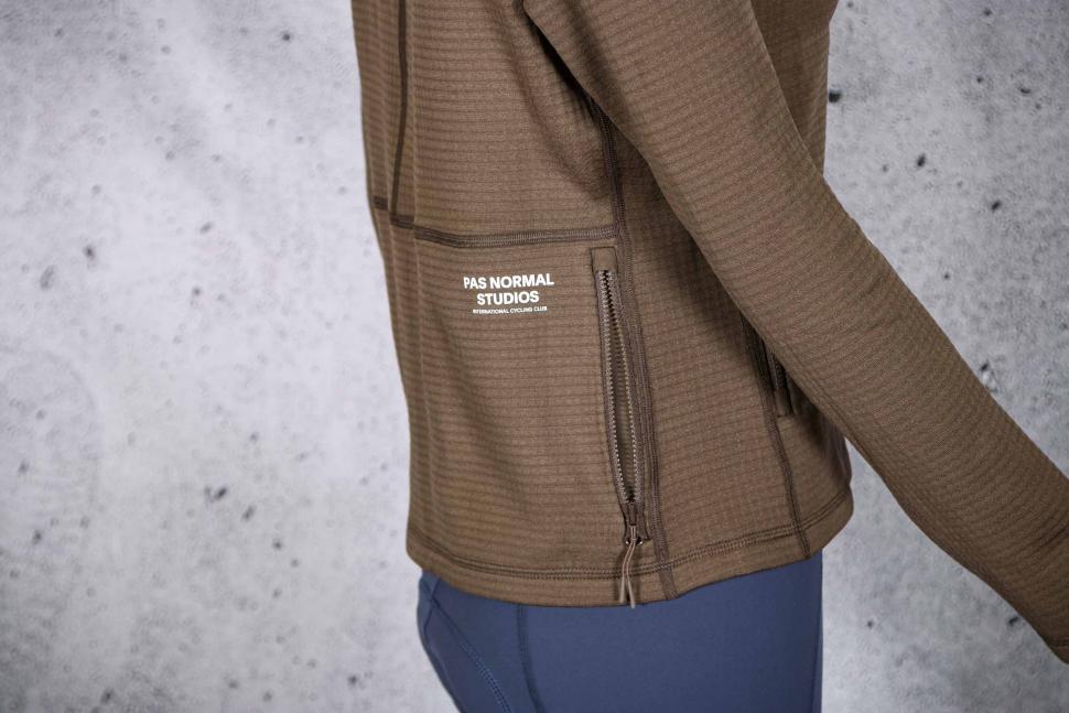 2022 Pas Normal Studios Women's Escapism Performance Fleece Zip - side pocket.jpg