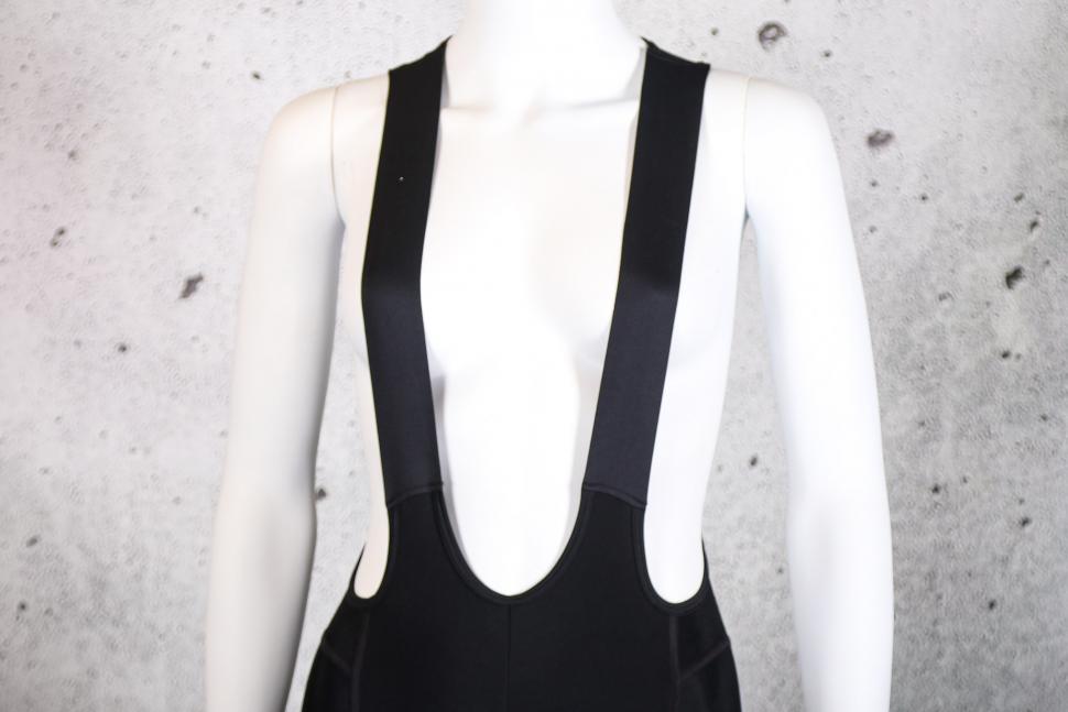 2022 Pas Normal Studios Women's Essential Thermal Bib - straps front.jpg
