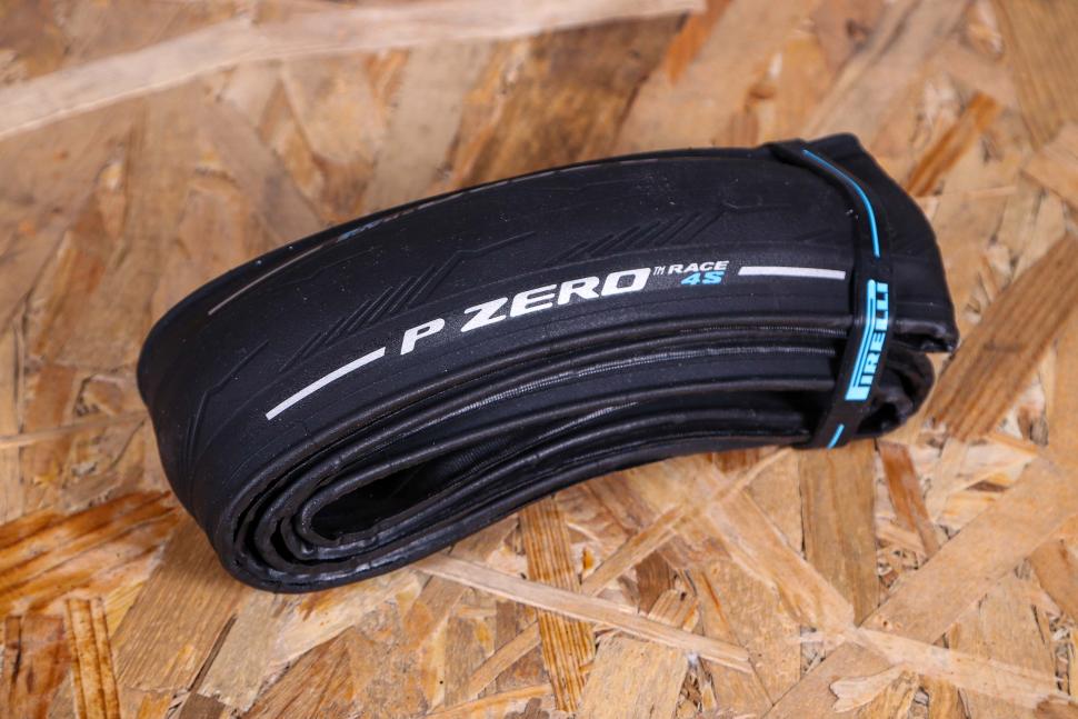 Pirelli P Zero Race 4S folded on wooden surface