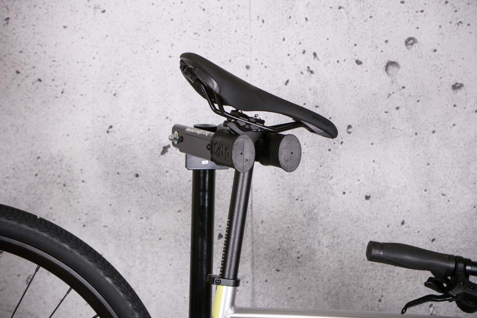 2022 PRO Bike Repair Stand - arm with bike.jpg